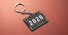 Load image into Gallery viewer, Pandemic Survivor Keychain ( 3 colours )