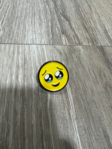 Teary eyed emoji enamel pin / face holding back tears emoji enamel pin