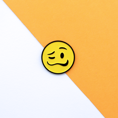 woozy face emoji enamel pin